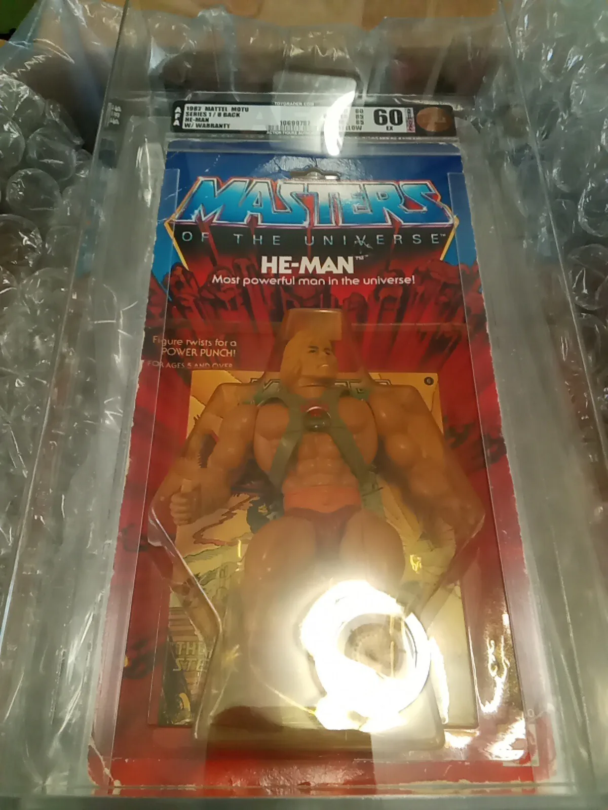 Vintage 1982 He-Man 8-back carded figure graded AFA 60 in an AFA case