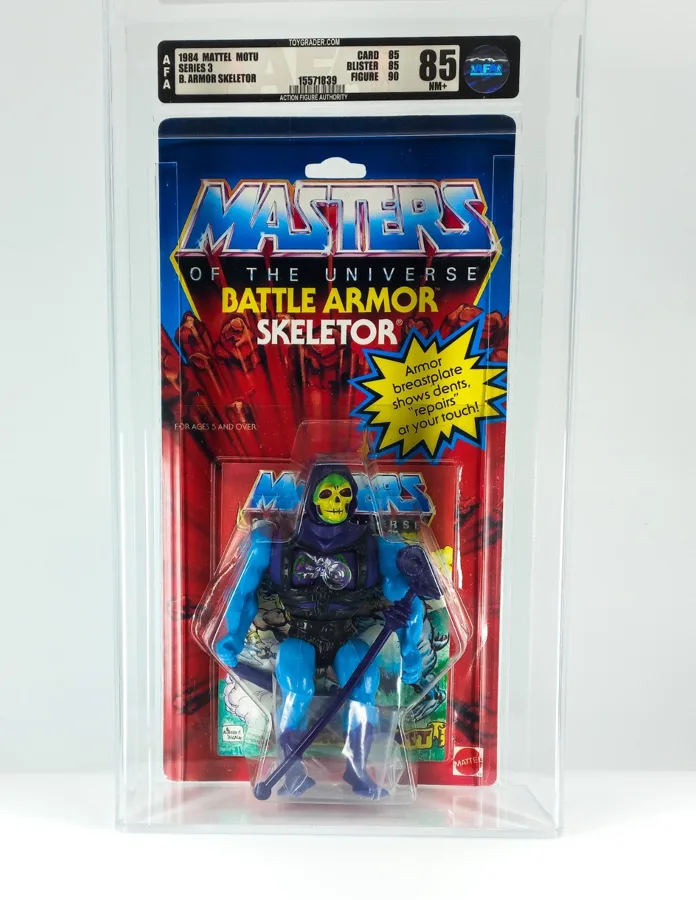Carded Battle Armor Skeletor in a clear AFA case with an 85 NM+ grading label