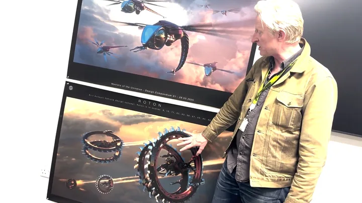 Guy Hendrix Dyas at the vehicle wall, the Roton board mounted beside him.