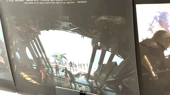 SC.19 EXT, Subterania, Landing Dock. The ribbed interior of the dock with figures gathered on the deck.