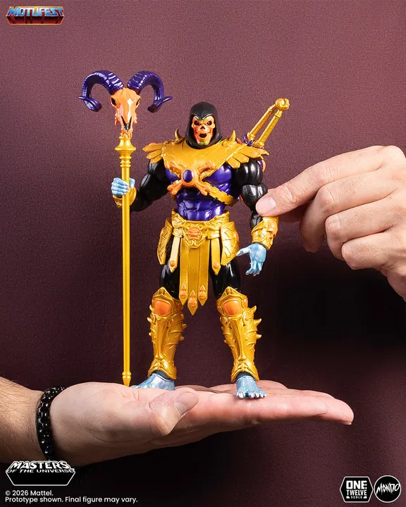 The 1/12 scale figure standing on an open palm, which is the clearest sense of its size in the whole set.