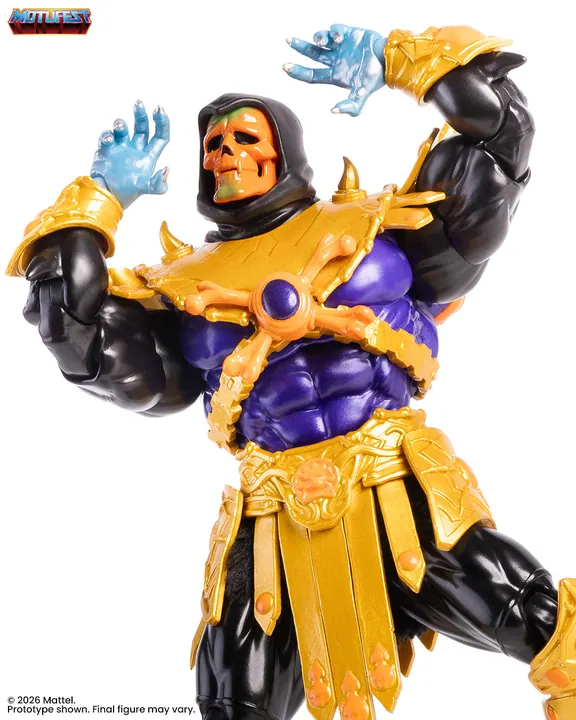 Chest and arms in close up against white, showing the orange harness, the gold pauldrons and the articulation at the shoulder.