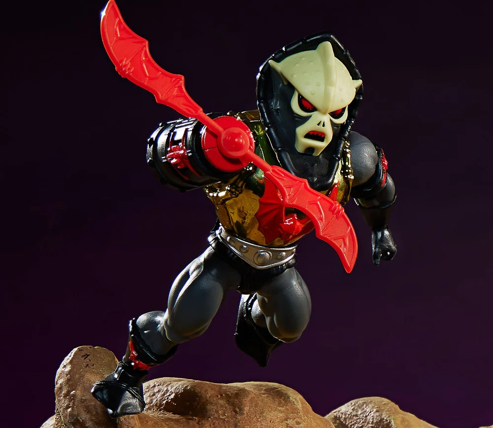 Masters of the Universe Origins Hurricane Hordak action figure, wearing golden VUM chest armor and holding the robot cannon arm with a spinning double blade attached.