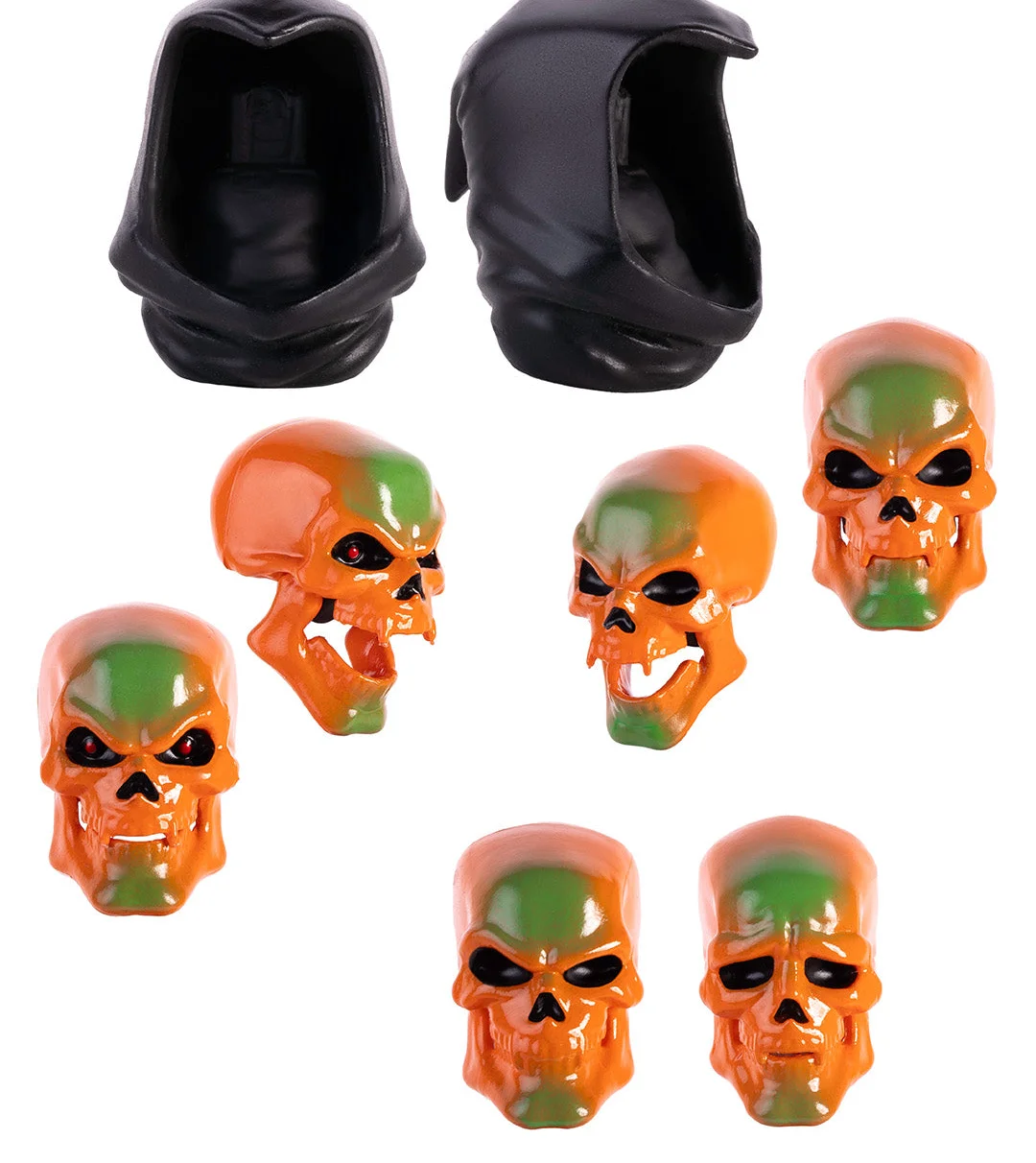 The interchangeable skull portraits for the 1/12 scale Disco Skeletor, laid out on white beside the two black hood pieces they fit into. Six orange and green skull heads, two with open jaws.