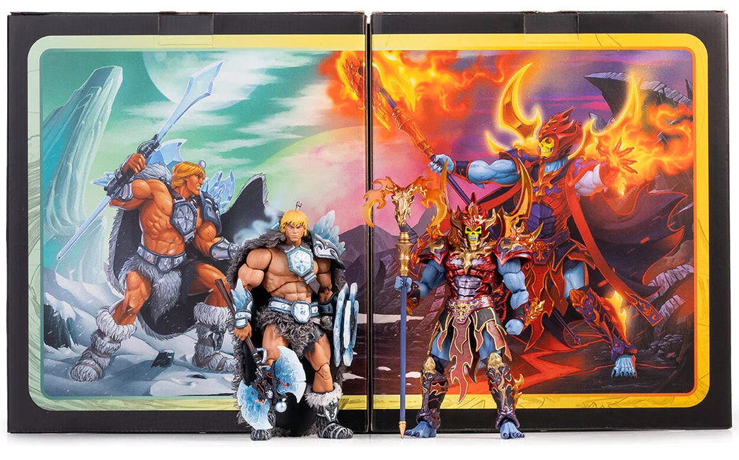 The Ice Armor He-Man and Fire Armor Skeletor set in its opened packaging, the two hinged panels showing a single painted scene that runs from a snowfield on the left into a lava flow on the right, with both figures standing in front of the join.