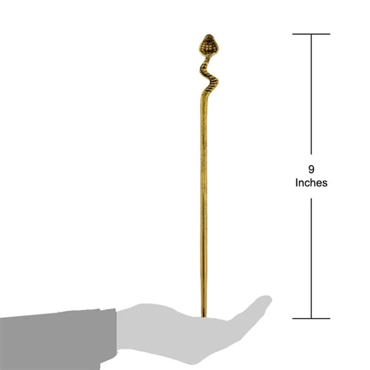 Factory Entertainment scale drawing showing the Staff of Ka standing in an open hand beside a bracket marked nine inches