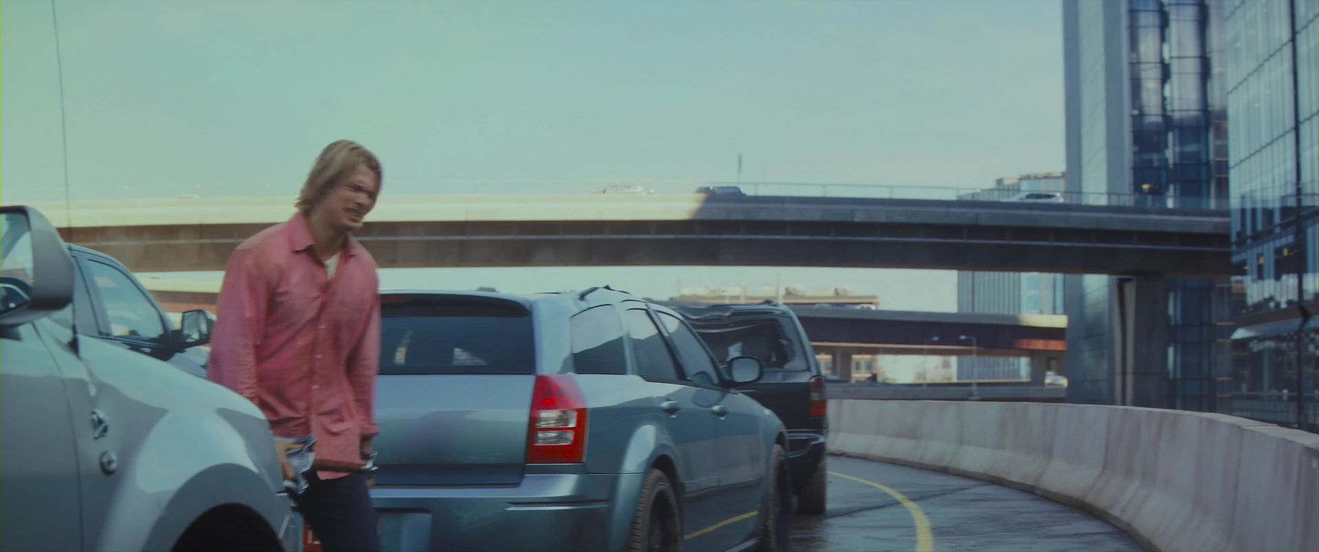 Adam, exposed on the highway as the hunt closes in.