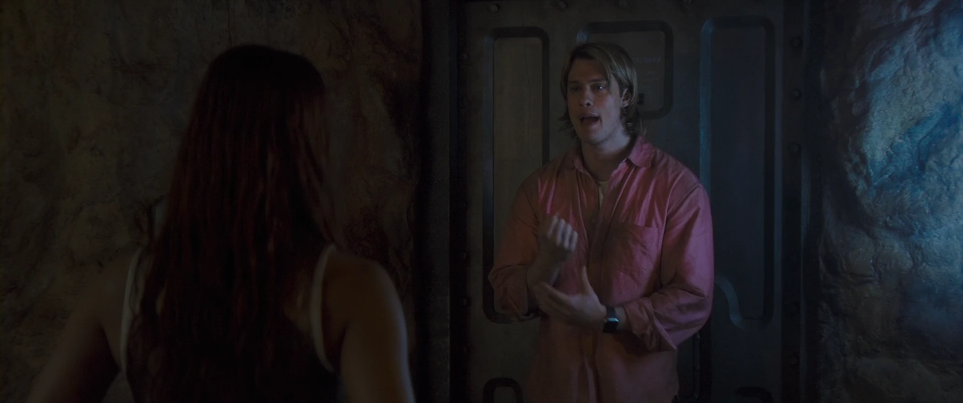 Adam and Teela debate how to turn the Power Sword against Skeletor.