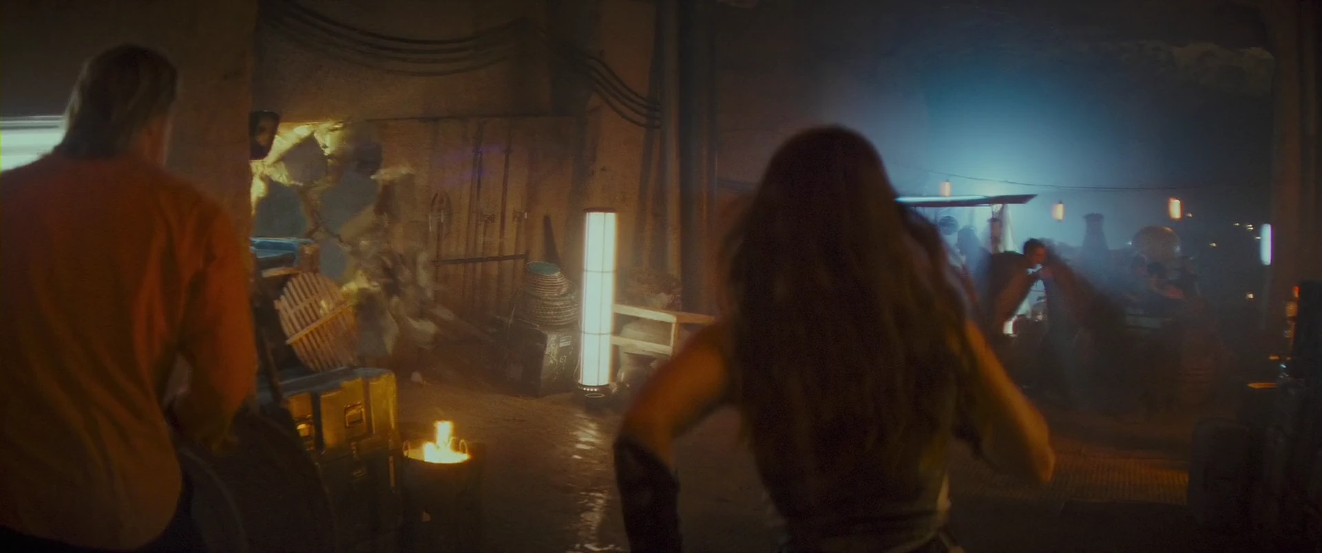 Teela and Adam run as the hideout comes under attack.