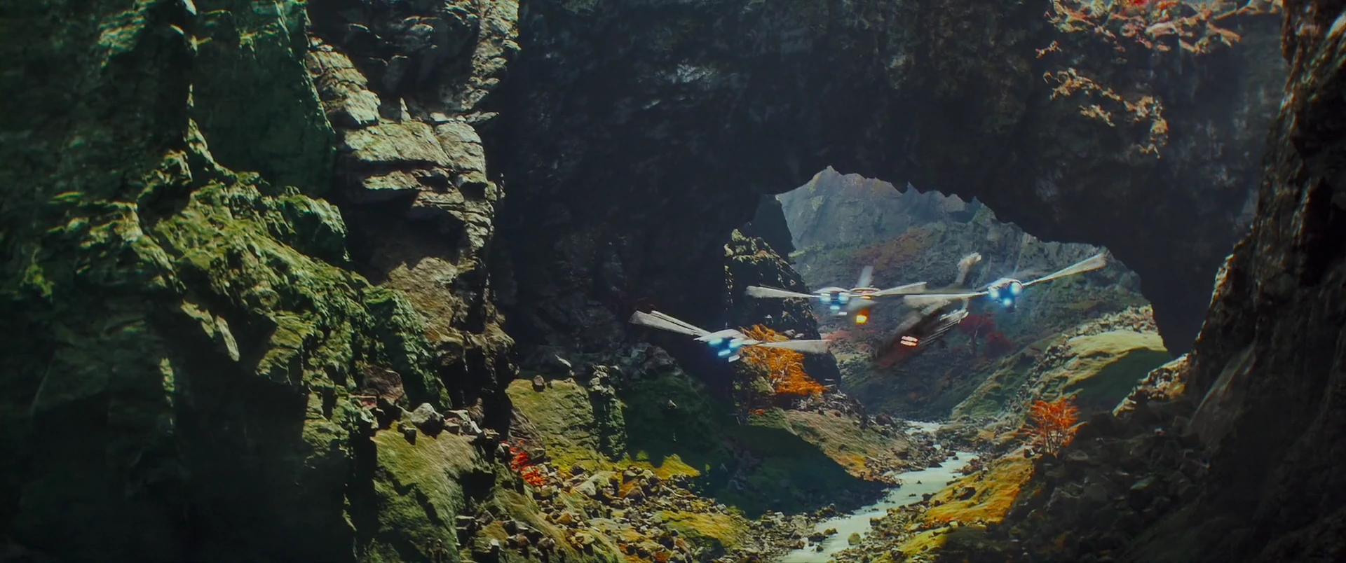 Teela’s ship threads the cliffs of Eternia toward Grayskull.