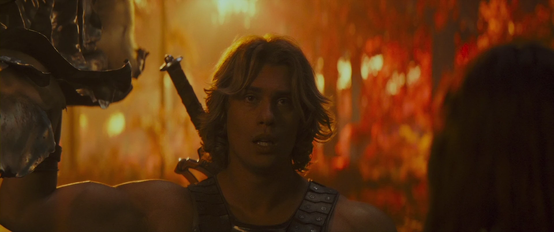 Adam steels himself, the sword on his back, as the company moves out.