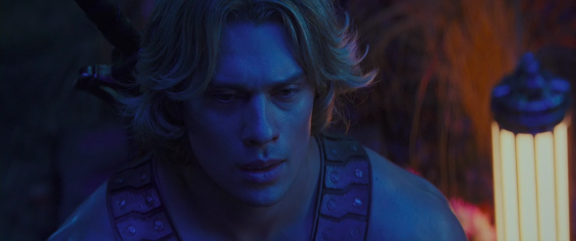 Adam by firelight, weighing what it will cost to become He-Man.