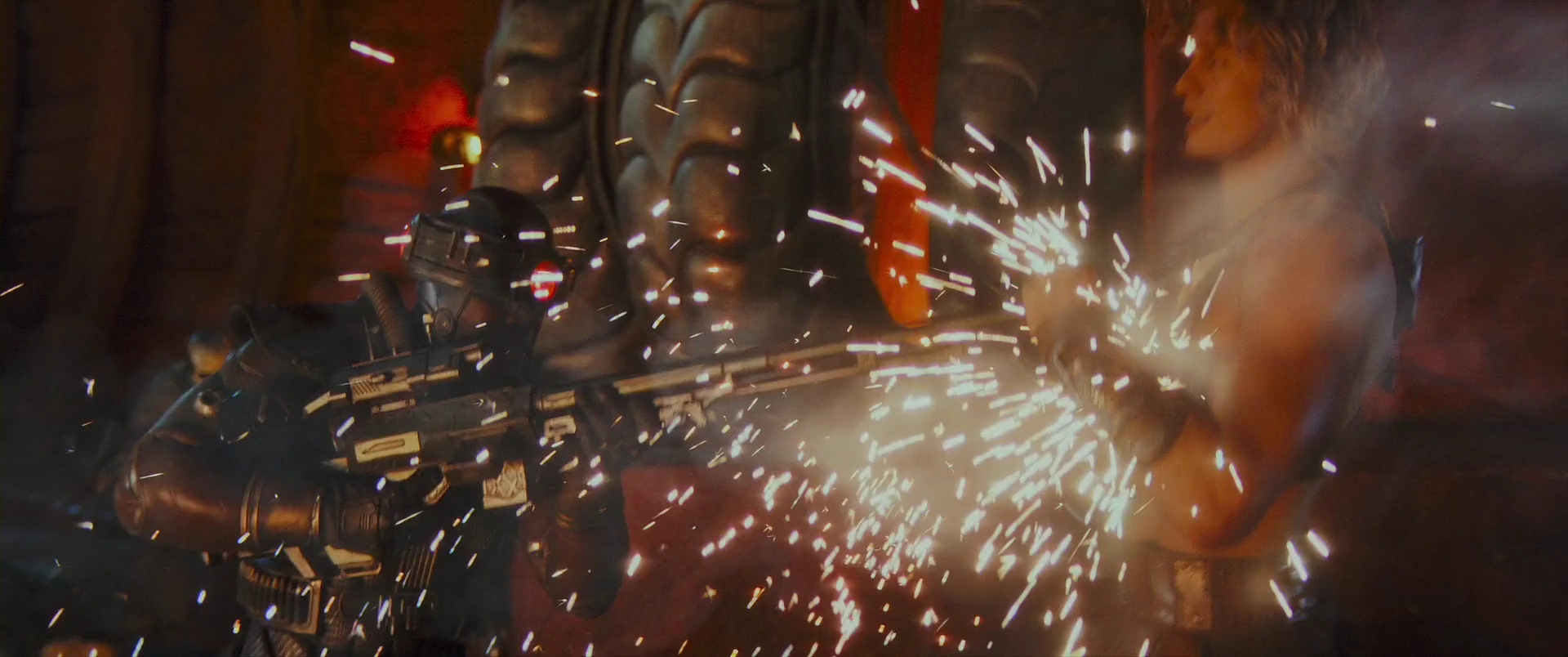 He-Man takes fire from one of Skeletor’s armored cyborgs.