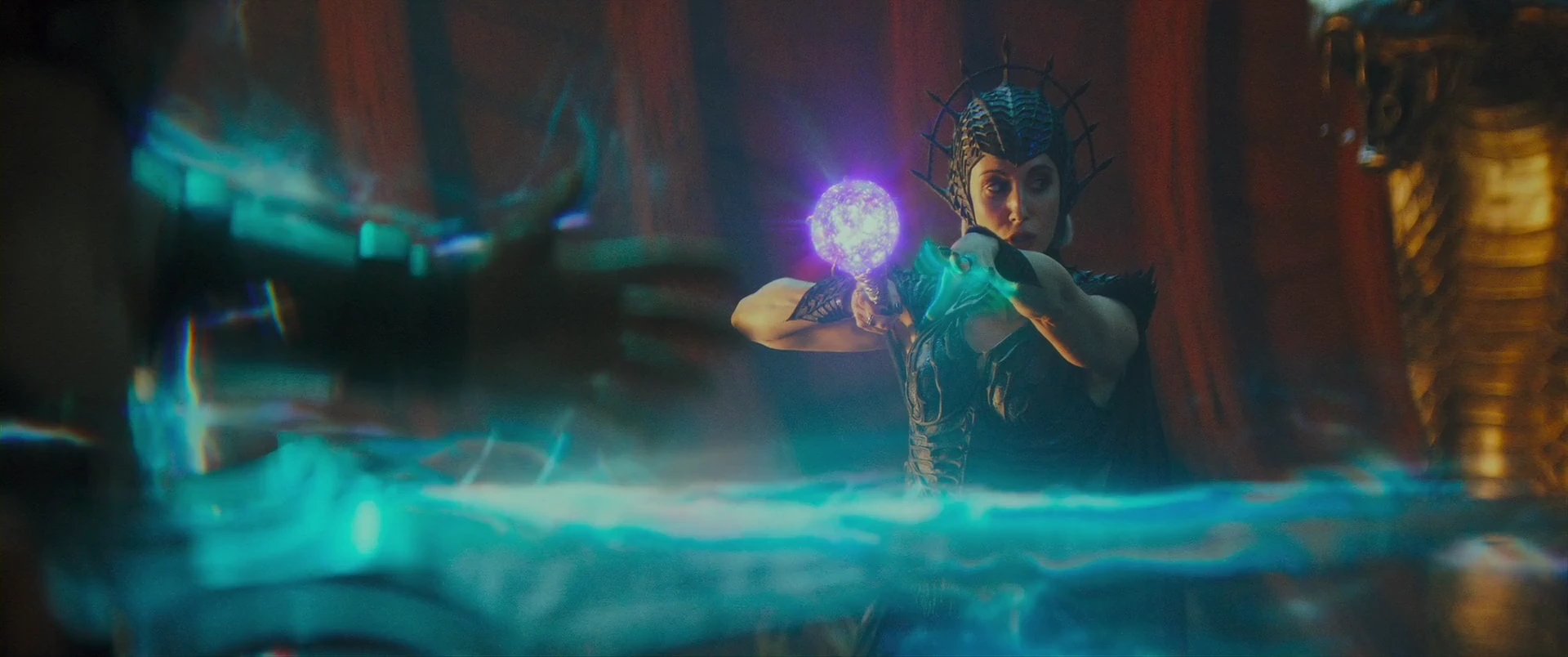Evil-Lyn unleashes the power of her orb-staff.