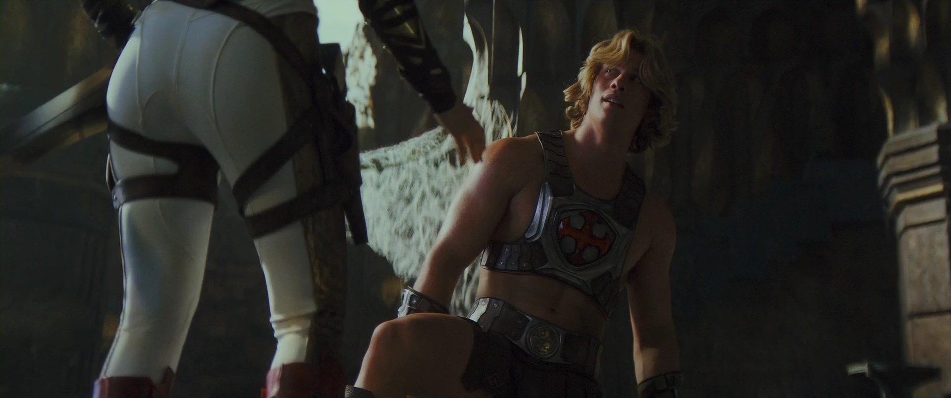 He-Man kneels beside Teela as the battle for Grayskull is won.