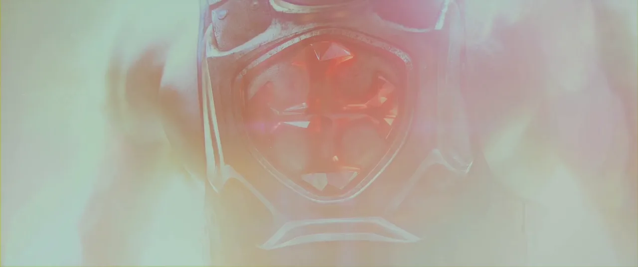 The He-Man chest emblem ignites during the transformation