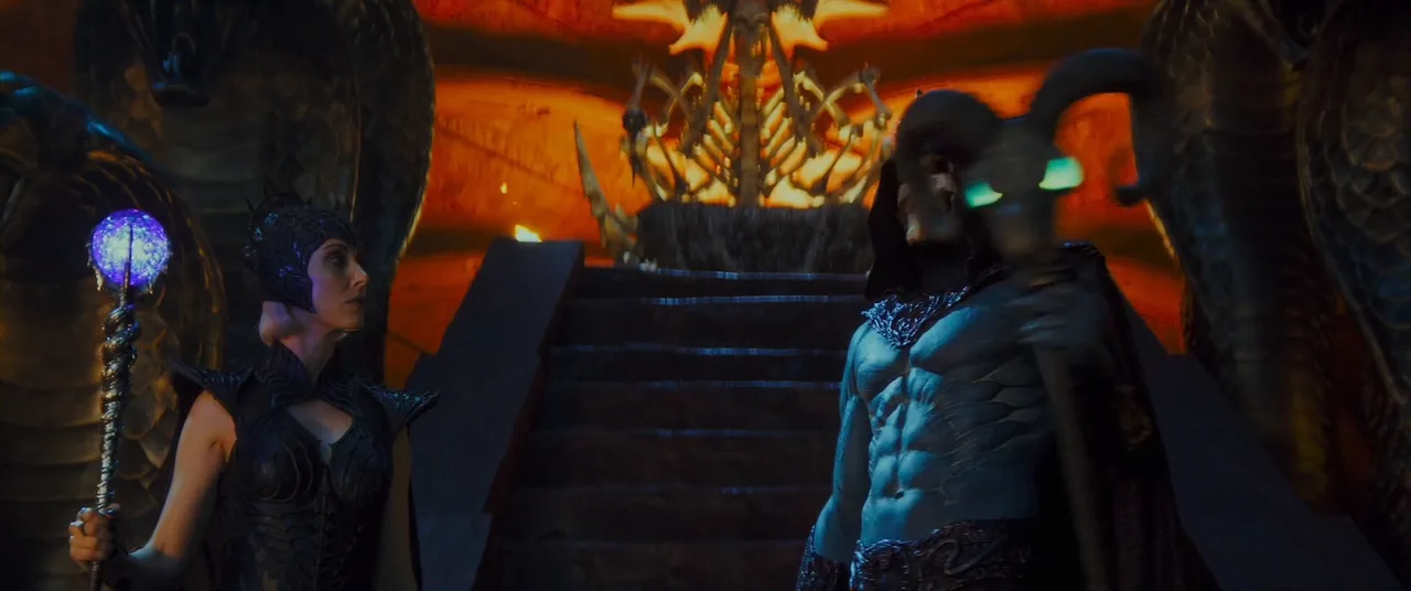 Evil-Lyn and Skeletor standing at the foot of the staircase in the Snake Mountain throne room, lit in orange and green