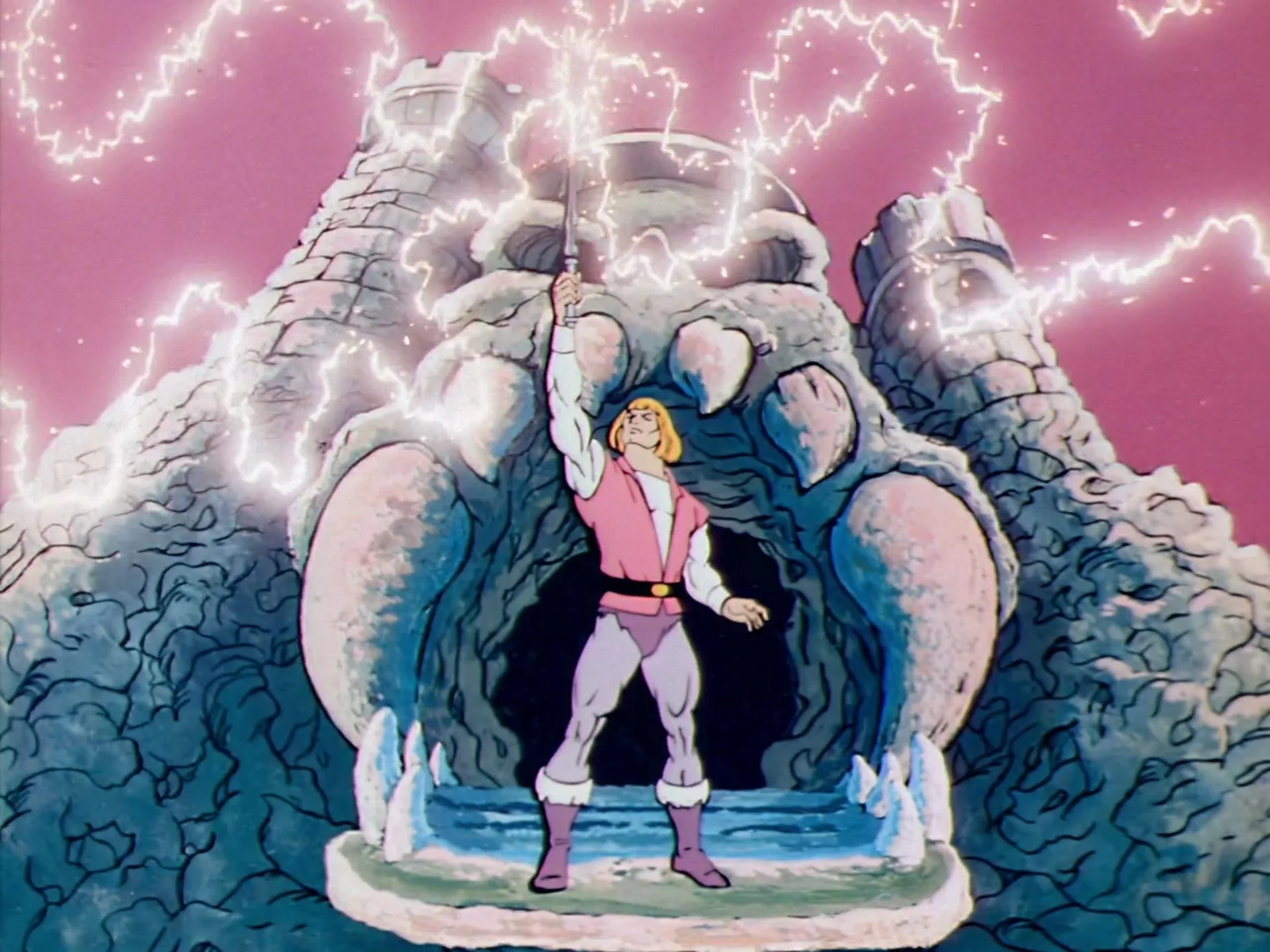 He-Man raises his sword before Castle Grayskull