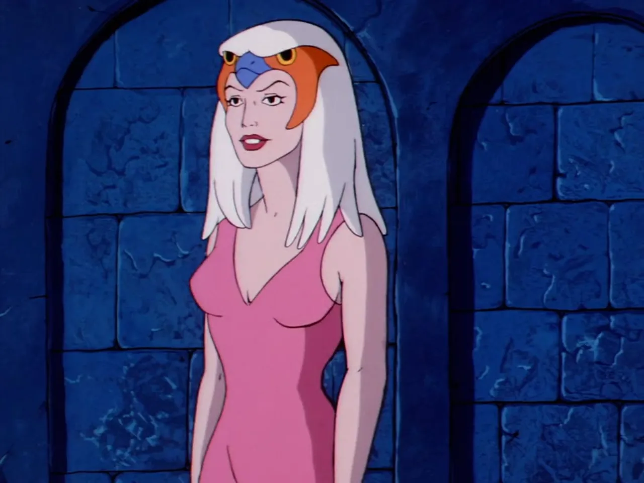 The guardian woman holds the Sword of Protection out in front of her within a glowing blue cavern.