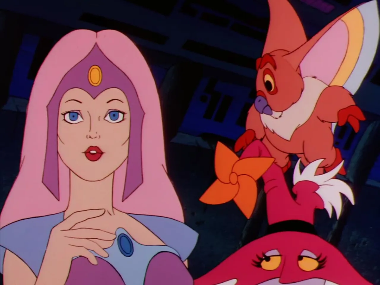Castaspella glances toward Kowl who holds a small orange pinwheel flower