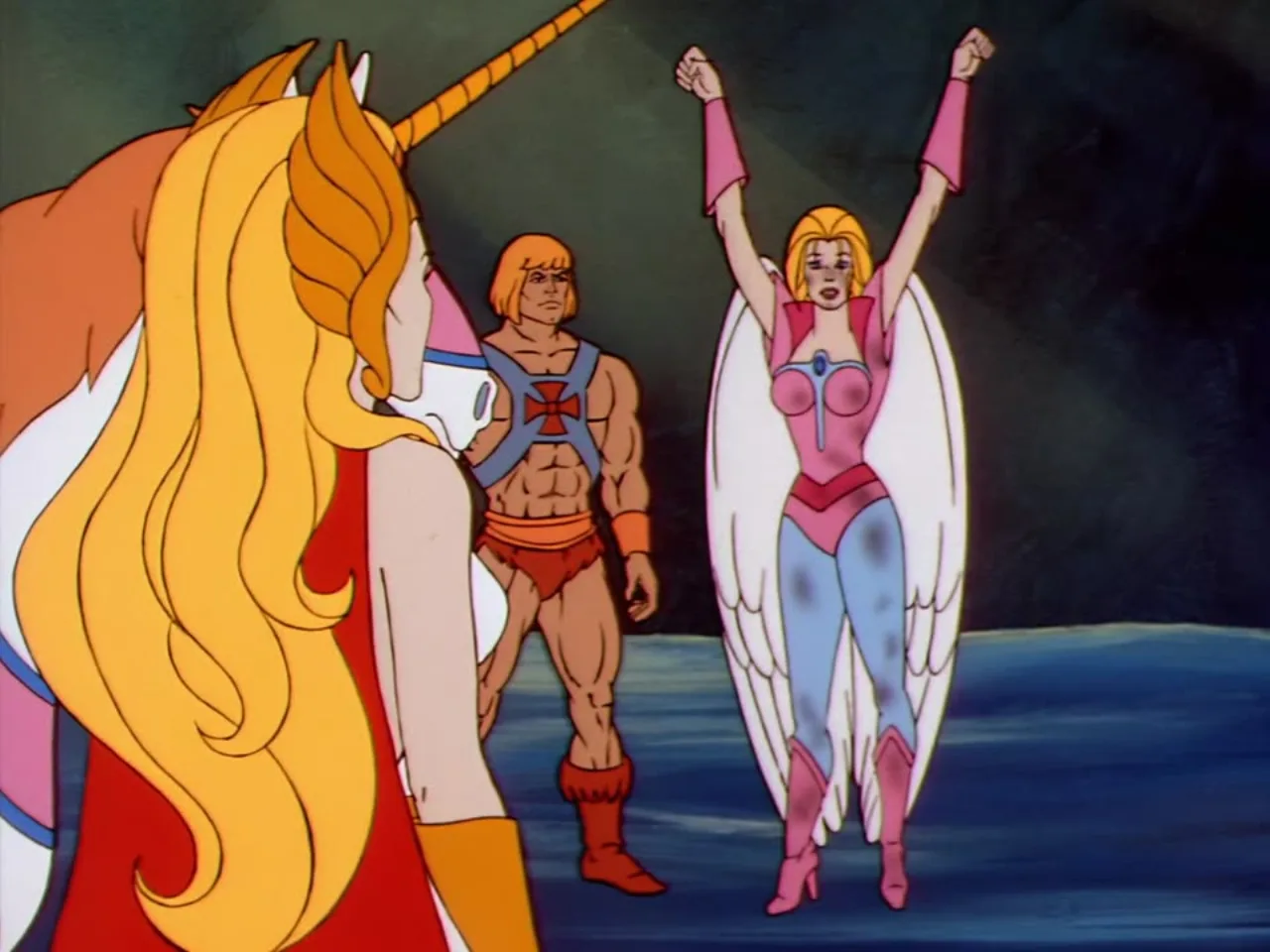 She-Ra raises both fists triumphantly into the air while He-Man and Swift Wind look on beside her.