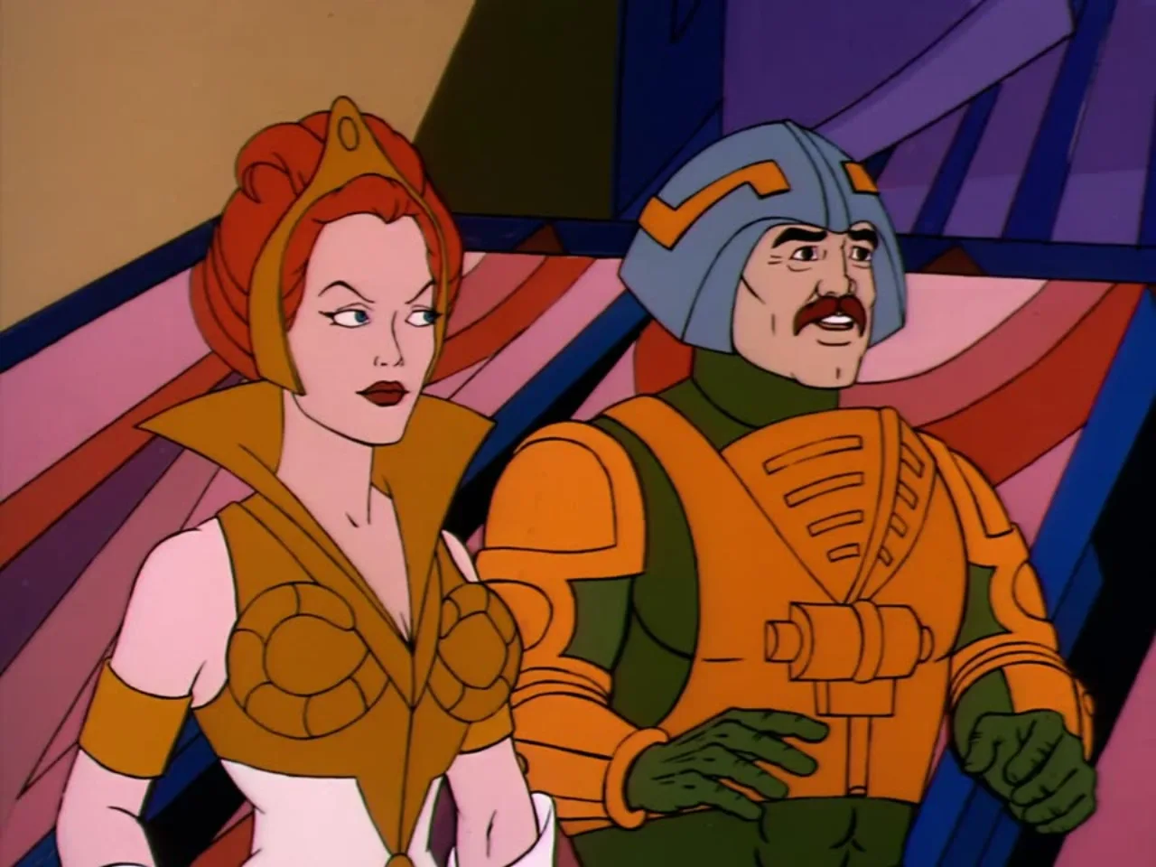 Teela and Man-At-Arms stand together inside the palace exchanging a concerned glance.