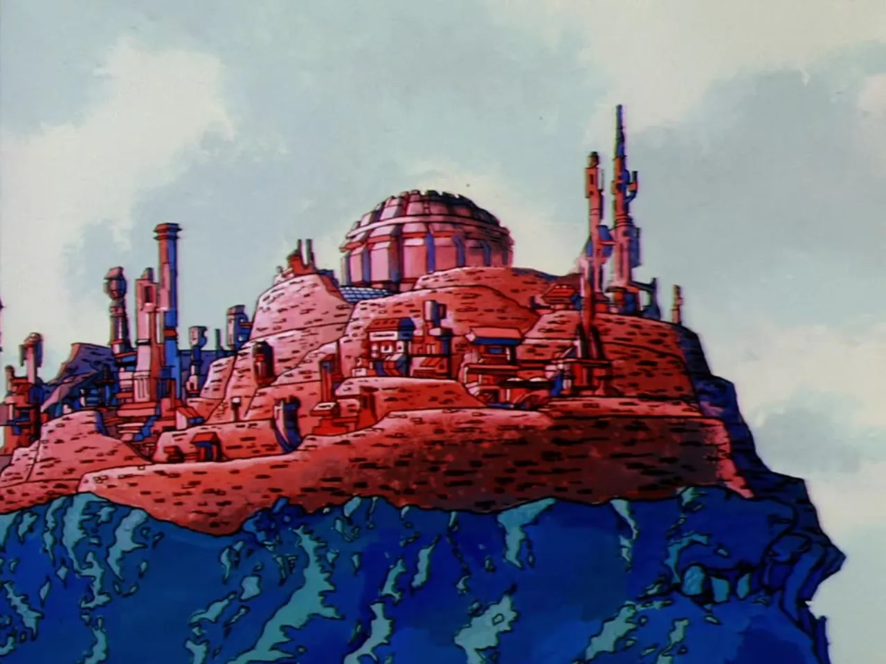 An aerial view shows the sprawling red-toned Fright Zone fortress perched atop a rocky floating outcrop.