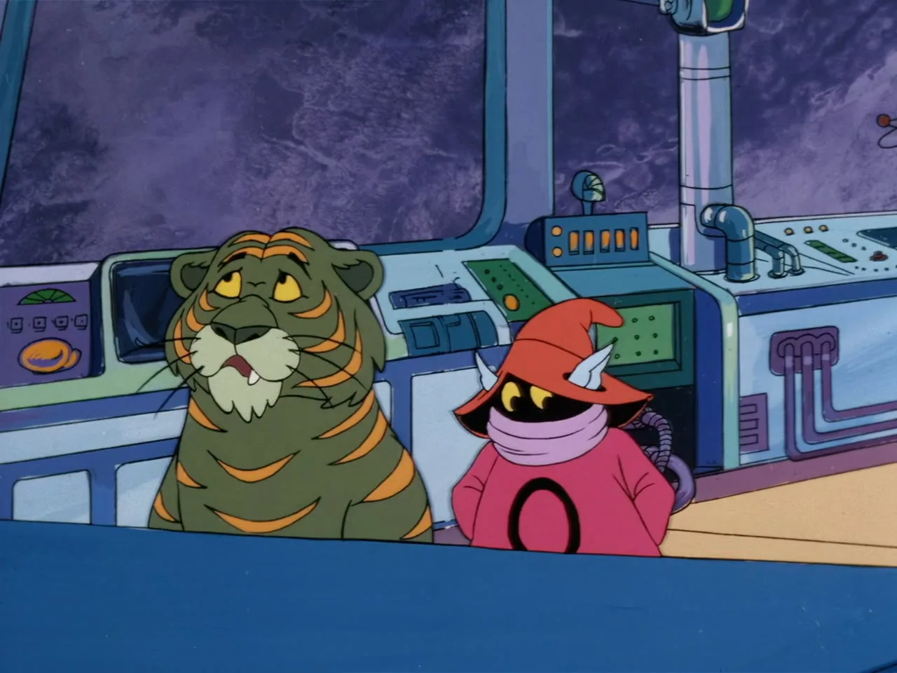 Cringer sits in Man-At-Arms workshop next to Orko, who is being scolded for messing with the lab powders.