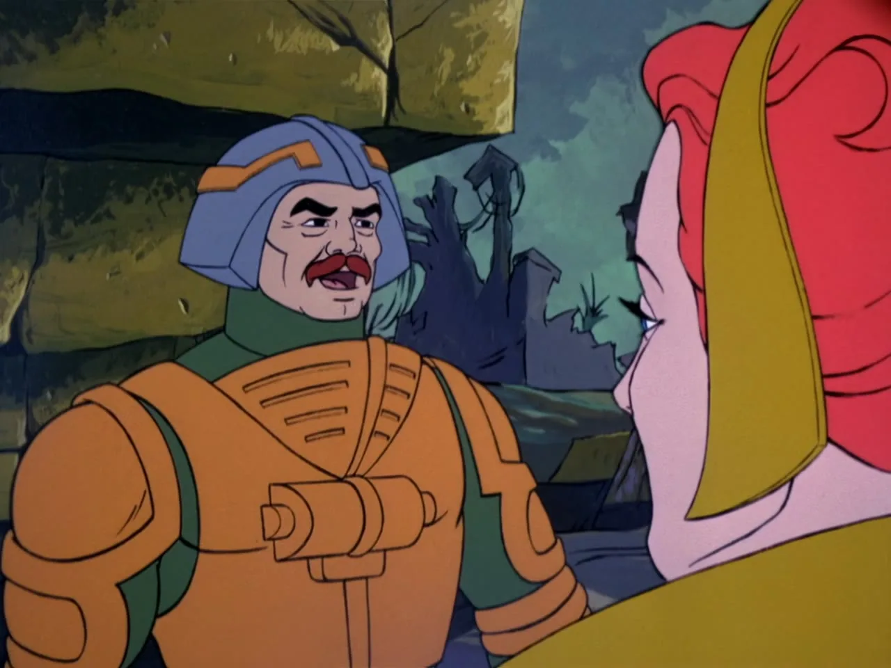 Cringer, Prince Adam, Ram Man, and Teela approach a large vine-covered ancient stone door together.