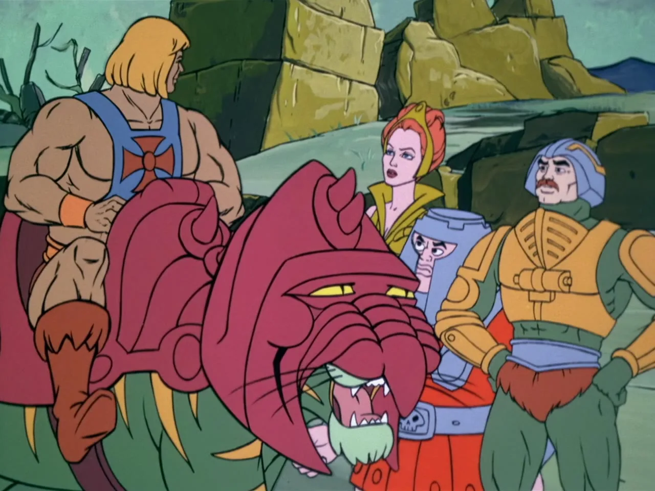 He-Man and Battle Cat are reunited with Teela, Orko, and Man-At-Arms on the rocky exterior.