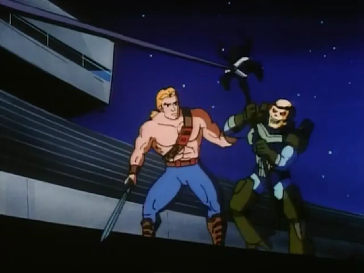 He-Man and Skeletor lock weapons beneath the arena stands.