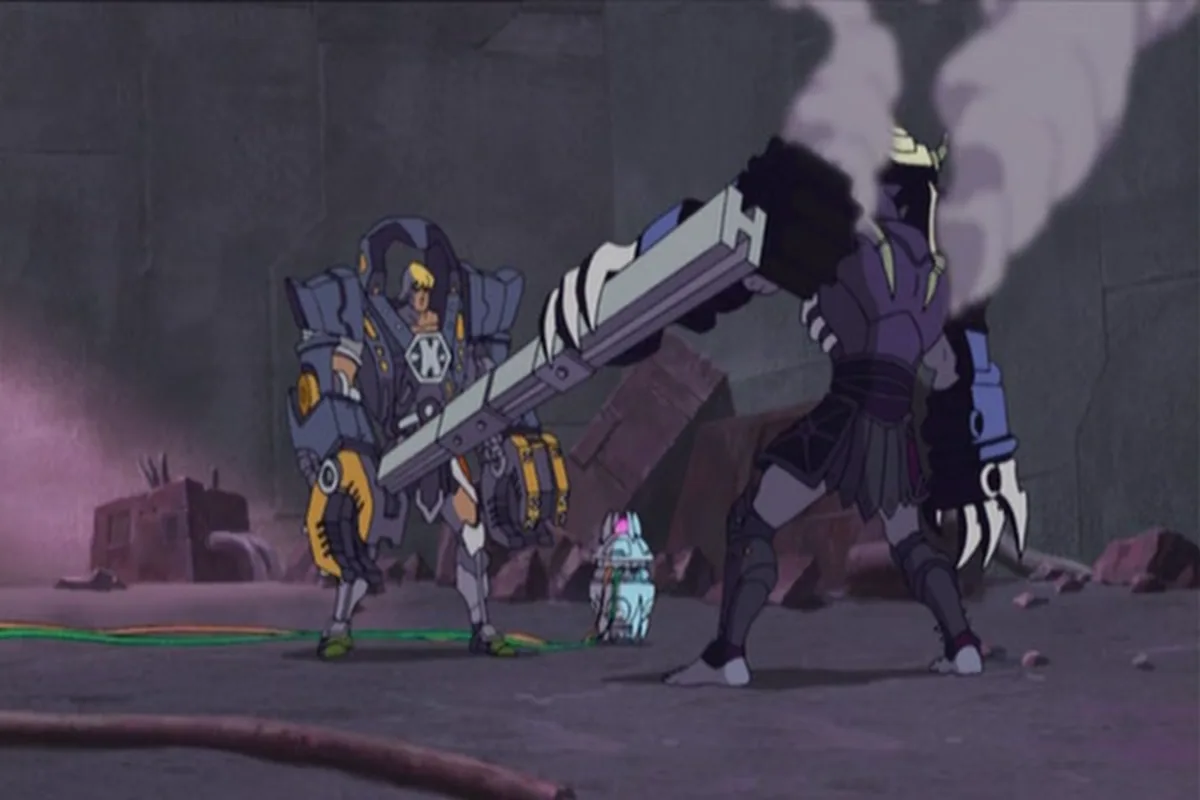 He-Man in the robotic suit levels a big cannon at Skeletor