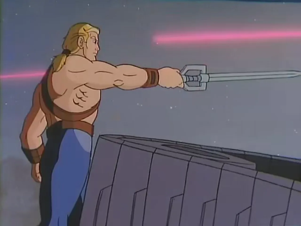 He-Man points his sword over a grey tank barrel as pink beams streak past.