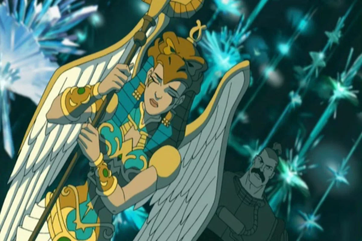 The Sorceress clutches her staff as Man-At-Arms watches from behind.