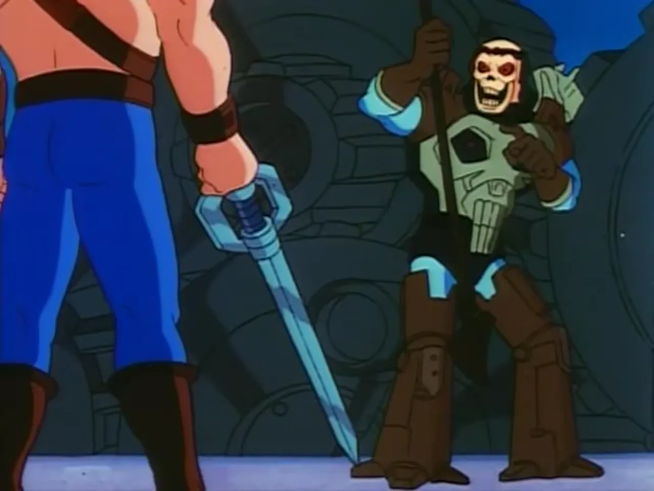 He-Man holds his sword down while Skeletor faces him with his own staff.